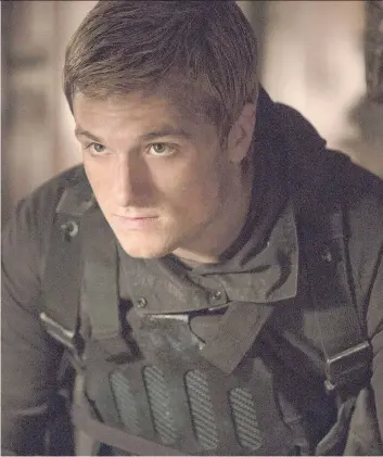  ?? MURRAY CLOSE/LIONSGATE/THE ASSOCIATED PRESS ?? Josh Hutcherson stars as Peeta Mellark in The Hunger Games: Mockingjay — Part 2. The former child actor has a number of projects, from indie to blockbuste­r, upcoming.