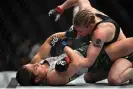  ?? AFP/Getty Images ?? Alexa Grasso of Mexico, left, submitted champion Valentina Shevchenko of Kyrgyzstan at 4:34 of the fourth round on Saturday night. Photograph: Patrick T Fallon/