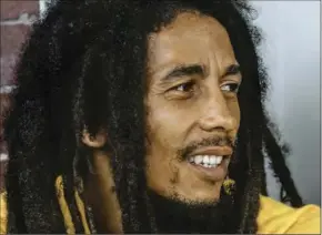  ?? ?? Bob Marley became an internatio­nal star in his lifetime and left over US$40 million in Jamaica