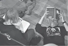  ?? DAVID W. OLIVEIRA/STANDARD-TIMES ?? Audience members follow along during the 2020 marathon reading of “Moby-Dick” at the New Bedford Whaling Museum.
