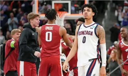  ?? Photograph: Kyle Terada/USA Today Sports ?? Gonzaga Bulldogs guard Julian Strawther (0) reacts after their upset loss to the Arkansas Razorbacks on Thursday night.