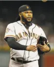  ?? Rick Scuteri / Associated Press ?? Johnny Cueto’s elbow sprain was deemed not significan­t enough to warrant surgery.