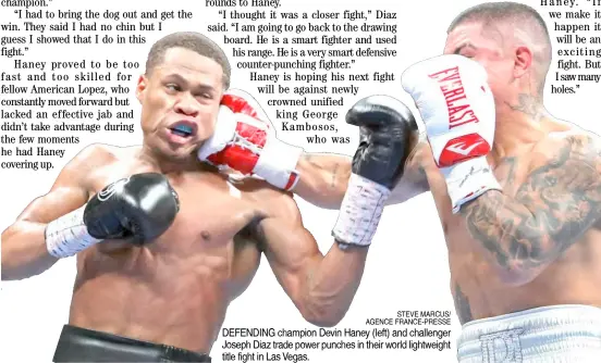  ?? STEVE MARCUS/ AGENCE FRANCE-PRESSE ?? DEFENDING champion Devin Haney (left) and challenger Joseph Diaz trade power punches in their world lightweigh­t title fight in Las Vegas.