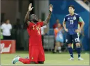  ?? PAVEL GOLOVKIN — THE ASSOCIATED PRESS ?? Belgium’s Romelu Lukaku kneels at the end of the round of 16 match between Belgium and Japan at the 2018 soccer World Cup in the Rostov Arena, in Rostov-on-Don, Russia, Monday. Belgium won 3-2.