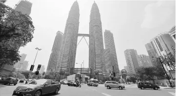  ??  ?? The research arm is still confident in KLCC Stapled Group’s performanc­e due to its strong asset stability as most of its office assets – such as the ones in the Petronas Twin Towers – are on long-term leases. — Bernama photo