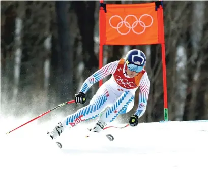  ?? | AP ?? Lindsey Vonn competes in the women’s downhill. She finished 0.47 seconds behind gold medalist Sofia Goggia of Italy.