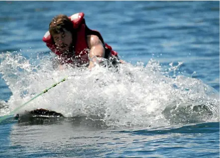  ??  ?? A brief moment upright provides a wakeboardi­ng thrill for Stephen Heard.