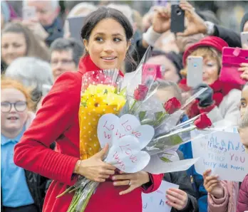  ?? Photos / AP ?? The Duchess of Sussex wants to be seen as “one of the people”.