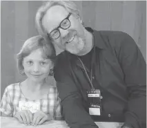  ?? TODD FAMILY ?? Zeph, known at the time as Sylvia, and his idol Adam Savage at a Maker Faire in 2009.