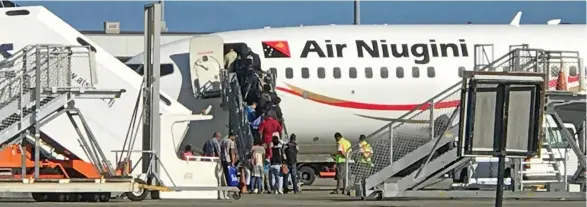  ?? Photo: Charles Chambers ?? Passengers boarding the Air Niugini direct flght to Port Moresby at Nadi Internatio­nal Airport on September 6, 2019.