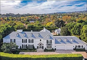  ?? SIMON BERLYN ?? KRISTIN TUTOR’S nearly one-acre Holmby Hills estate sold for $26.15 million.