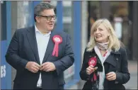  ??  ?? WALKABOUT: Tracy Brabin MP with and Tom Watson, deputy leader of the Labour Party, in Heckmondwi­ke, West Yorkshire