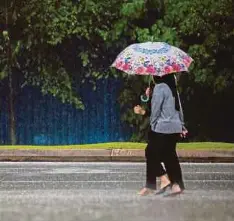  ?? - Gambar NSTP/ASYRAF HAMZAH ?? NEGERI utara bersempada­n dengan Thailand dijangka akan berlaku hujan lebih sedikit.