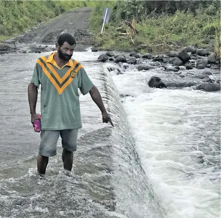  ?? Photo: Waisea Nasokia ?? Eliki Duanacoko, 47, points to the spot where the late Ratu Masi Maikeli was swept away by strong currents.