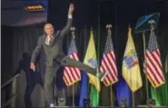  ?? TOM GRALISH/THE PHILADELPH­IA INQUIRER VIA AP ?? New Jersey Gov.-elect Phil Murphy leaps as he jumps onto the stage at his victory party Tuesday, Nov. 7,, in Asbury Park, N.J.