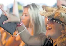  ?? PETE FISHER/NORTHUMBER­LAND TODAY ?? A crowd from the Boots and Hearts country music festival in 2014. A two-day country fest called Frost Stampede comes to the Scotiabank Convention Centre in Niagara Falls next February.