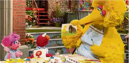  ??  ?? (From left) Abby Cadabby, Elmo and Big Bird in a scene from Sesame Street. The children’s TV show first aired in the fall of 1969. — Handout