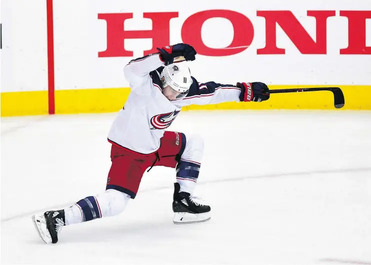  ?? — THE ASSOCIATED PRESS ?? Blue Jackets’ Matt Calvert celebrates his overtime game-winning goal in Game 2 of their East Conference quarter-final Sunday against the Capitals.