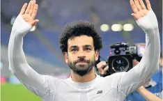  ??  ?? HEADING FOR KIEV Mo Salah celebrates as Liverpool reached the Champions League final on Wednesday night in Rome