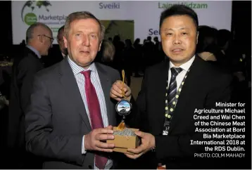  ??  ?? Minister for Agricultur­e Michael Creed and Wai Chen of the Chinese Meat Associatio­n at Bord Bia Marketplac­e Internatio­nal 2018 at the RDS Dublin.