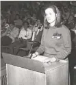  ??  ?? Ann Merrill speaks to the San Diego Unified school board in 1968 on behalf of a group that worked to desegregat­e San Diego schools.