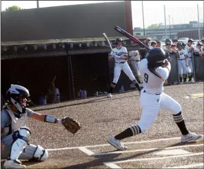  ?? (NWA Democrat-Gazette/Flip Putthoff) ?? Bentonvill­e’s Alexis Lorennij (9) lines a double for one of her two hits Tuesday in the Lady Tigers’ 12-2 victory over Bentonvill­e West.