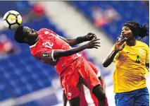  ?? JEWEL SAMAD/GETTY IMAGES ?? Sixteen-year-old Canadian midfielder Alphonso Davies, left, will have a chance to showcase his considerab­le talent Saturday in a friendly against Jamaica at Toronto’s BMO Field.