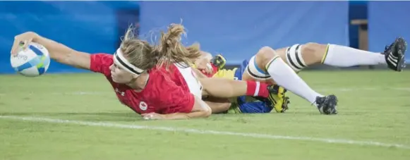  ?? LUCAS OLENIUK/TORONTO STAR ?? Canadian Karen Paquin scored a try early in Saturday’s rugby sevens clash with Brazil, on the way to a second straight victory on the day for Canada, which takes on Britain on Sunday.