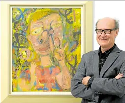  ?? —PHOTOS BY AFP ?? DISCOVERY US artist and illustrato­r James Warhola stands next to his uncle Andy Warhol’s “Nosepicker 1: Why Pick on Me” on display at Phillips Auction House in New York.