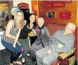  ??  ?? May Bishop (second from right) celebrates her birthday with great granddaugh­ters Jasmin (left) and Jessica Wallin and family friend Tony McCaffrey.