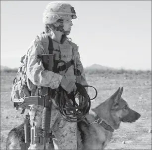  ?? Jacob Yakob/Bleecker Street ?? Kate Mara as Megan Leavey with Rex in "Megan Leavey."