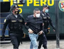  ?? PHOTO: REUTERS ?? A man is detained by police after they raided a nightclub for hosting a party in violation of Covid19 restrictio­ns in Lima recently. Peru has one of the highest death rates from the disease.