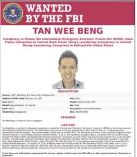  ?? — AP ?? Person of interest: A wanted poster of Tan released by FBI.