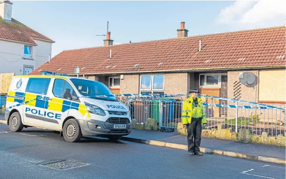  ??  ?? Police outside the house in Alison Street, Kirkcaldy, where in February this year Leslie Fraser brutally murdered Kevin Byrne.