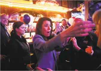  ?? Scott Strazzante / The Chronicle ?? District Two Supervisor Catherine Stefani greets supporters as she arrives for her election night party at Silver Cloud in S.F. She was appointed to her seat by Mayor Mark Farrell.