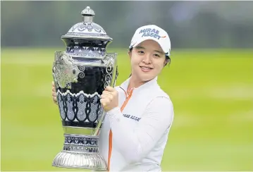  ?? EPA ?? South Korea’s Kim Sei-Young poses with the Lorena Ochoa Match Play trophy.