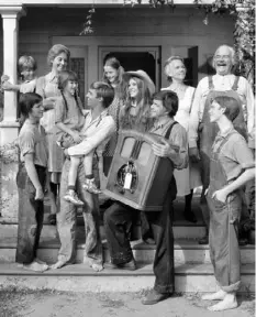  ?? CBS Photo Archive via AP ?? The cast of "The Waltons" in 1974: David Harper, left, Eric Scott, Michael Learned, Kami Cotler, Richard Thomas, Mary McDonough, Judy Norton, Ralph Waite, Ellen Corby, Will Geer and Jon Walmsley.