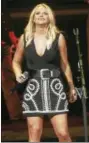  ?? PHOTO BY JOHN ATASHIAN ?? Singer and songwriter Miranda Lambert greats her fans during her concert at the Xfinity Theater in Hartford on Friday, Aug. 19. The country music singer performed hits from her five albums including material from her latest release “Platinum.” For...