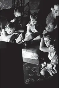  ??  ?? Children gather around a TV screen in this 1956 image. The following year the “Toddlers’ Truce” ended, after lobbying from ITV
