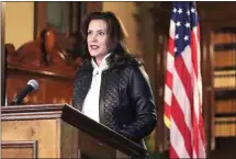  ?? MICHIGAN OFFICE OF THE GOVERNOR VIA AP ?? In a photo provided by the Michigan Office of the Governor, Michigan Gov. Gretchen Whitmer addresses the state during a speech in Lansing, Mich., Thursday.