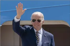  ?? GEMUNU AMARASINGH­E — THE ASSOCIATED PRESS FILE ?? President Joe Biden waves as he boards Air Force One at Andrews Air Force Base, Md.