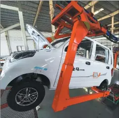  ?? WANG JILIN / FOR CHINA DAILY ?? Due to declining subsidies, the market for new energy vehicles is unlikely to continue the momentum it has seen in recent years. John Zeng, managing director of LMC Automotive Consulting (Shanghai) were sold in China from January to November this year