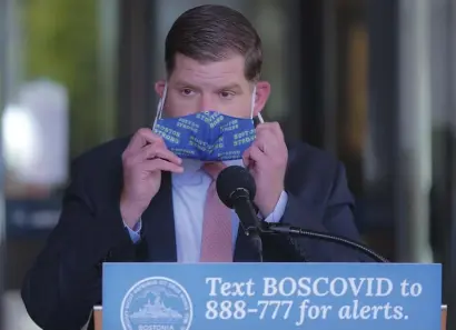  ?? POOL PHOTO ?? ‘STAY HEALTHY’: Mayor Martin Walsh speaks about coronaviru­s concerns outside City Hall Thursday, announcing small business grants and saying the city will work with restaurant­s on outdoor seating.