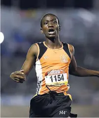  ??  ?? Rhodes Hall’s Rovane Williams reacts after winning the Class One boys 400m hurdles in a record 49.94 at the ISSA/GraceKenne­dy Boys and Girls’ Athletics Championsh­ips at the National Stadium last night.