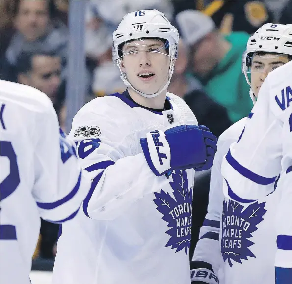  ?? — AP PHOTO ?? Toronto’s Mitch Marner celebrates his first goal since the season-opener in Saturday’s win by the Leafs over the Bruins in Boston.