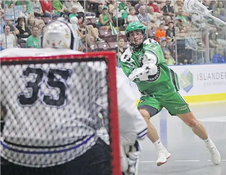  ?? ADRIAN LAM, TIMES COLONIST ?? Shamrocks forward Bennett Smith fires a shot on Thunder goaltender Kyle Mooney during WLA action at The Q Centre on Friday night.