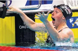  ?? Adam Pretty / Getty Images ?? Lilly King rejoices after adding a world title in the 100-meter breaststro­ke to the Olympic gold she won in the event.