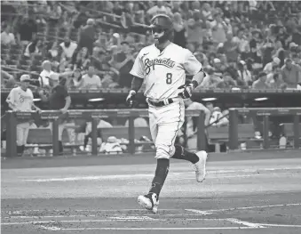  ?? ROB SCHUMACHER /THE REPUBLIC ?? The D-Backs’ Jordan Luplow touches home plate after hitting a two-run home run against the Minnesota Twins in the first inning at Chase Field. Through Friday, Luplow was hitting .183 but had an OPS of .782 with nine homers.