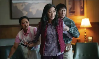  ?? Photograph: Allyson Riggs/AP ?? ‘It boils down to a universal story about family’ … Stephanie Hsu, Michelle Yeoh and Ke Huy Quan in Everything Everywhere All at Once.