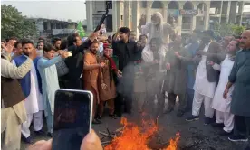  ?? Photograph: Shah Meer Baloch/The Guardian ?? Pro-Imran Khan protesters in Rawalpindi. Police used teargas after stones were thrown at them.